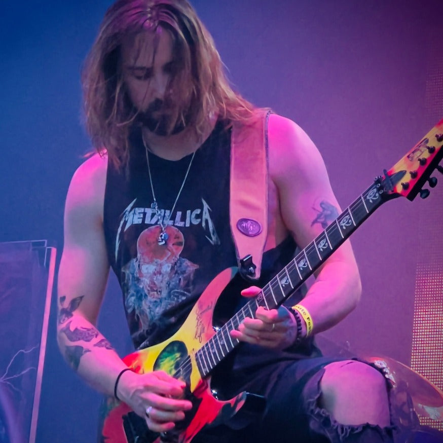 Jack from Metal Militia on stage wearing FINAL LAUGH sterling silver pendant