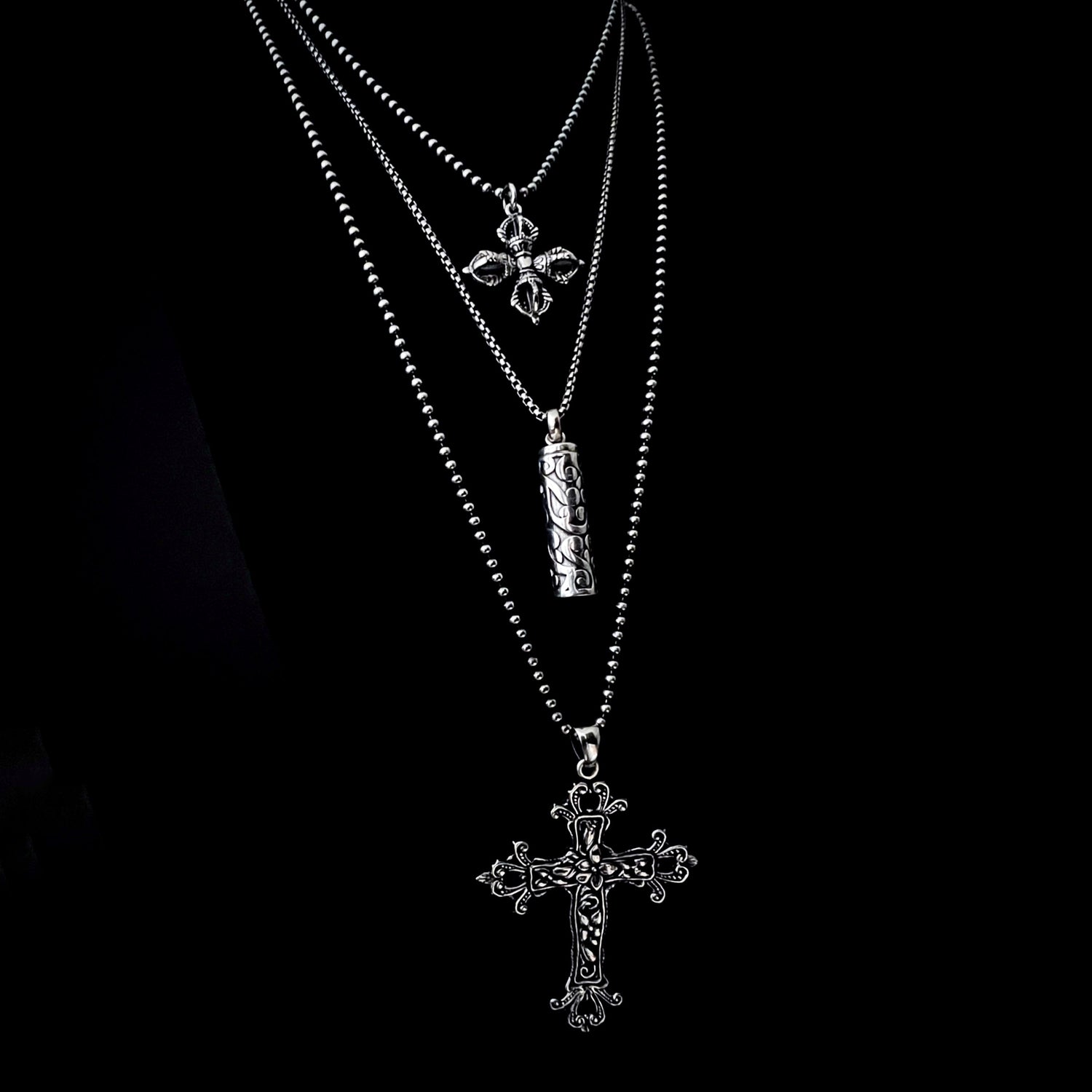 UNHOLY CONFESSIONS a silver sterling collision of holy silhouettes, heavy metal, and zero shame.