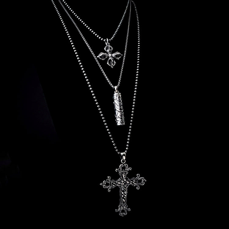 UNHOLY CONFESSIONS a silver sterling collision of holy silhouettes, heavy metal, and zero shame.