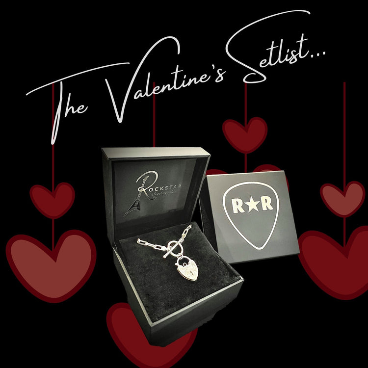The Valentine’s Setlist image on a black background with hanging red hearts, featuring the ACCESS DENIED sterling silver locket by ROCKSTAR★REFINEMENTS™ in a gift box with the R★R guitar pick logo.