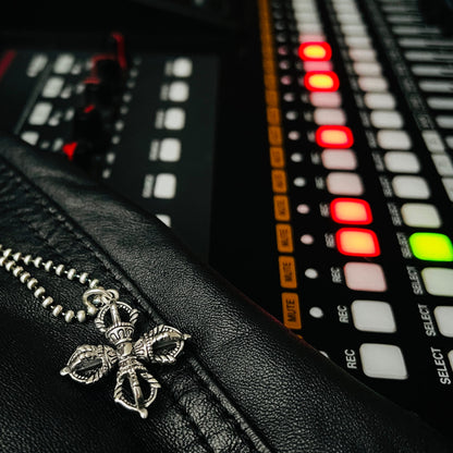 ALTAR EGO sterling silver Gothic cross pendant necklace by ROCKSTAR★REFINEMENTS™, shown on a recording desk