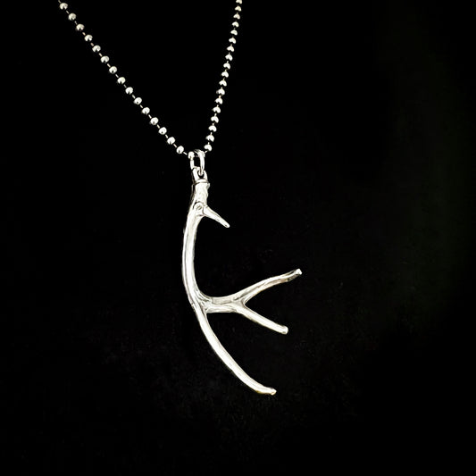 NO EYE DEER — sterling silver antler pendant photographed on an oxidised ball chain against a black background by ROCKSTAR★REFINEMENTS