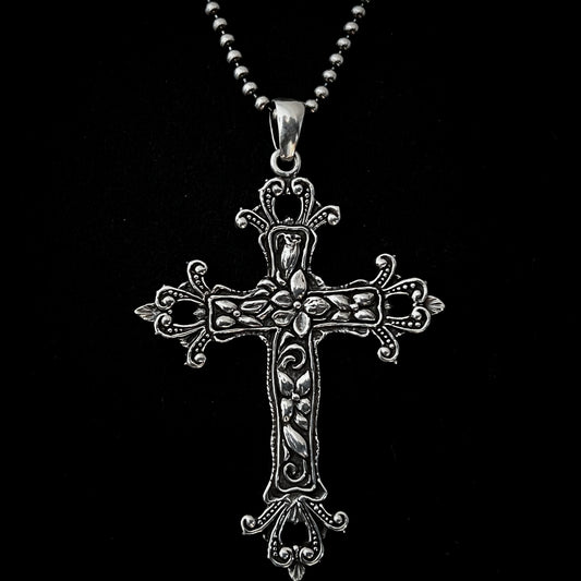 The OUTLAW'S CROSS sterling silver gothic cross pendant by ROCKSTAR★REFINEMENTS, front close-up view