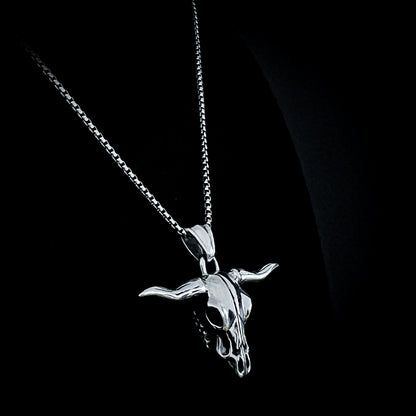 Sterling silver Point of No Return longhorn skull pendant on 18 inch box chain, side view