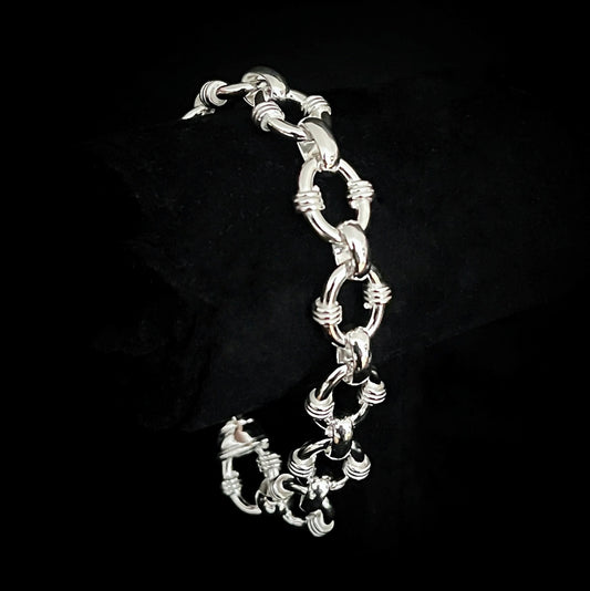 AFTERPARTY sterling silver link bracelet on black background by ROCKSTAR★REFINEMENTS™