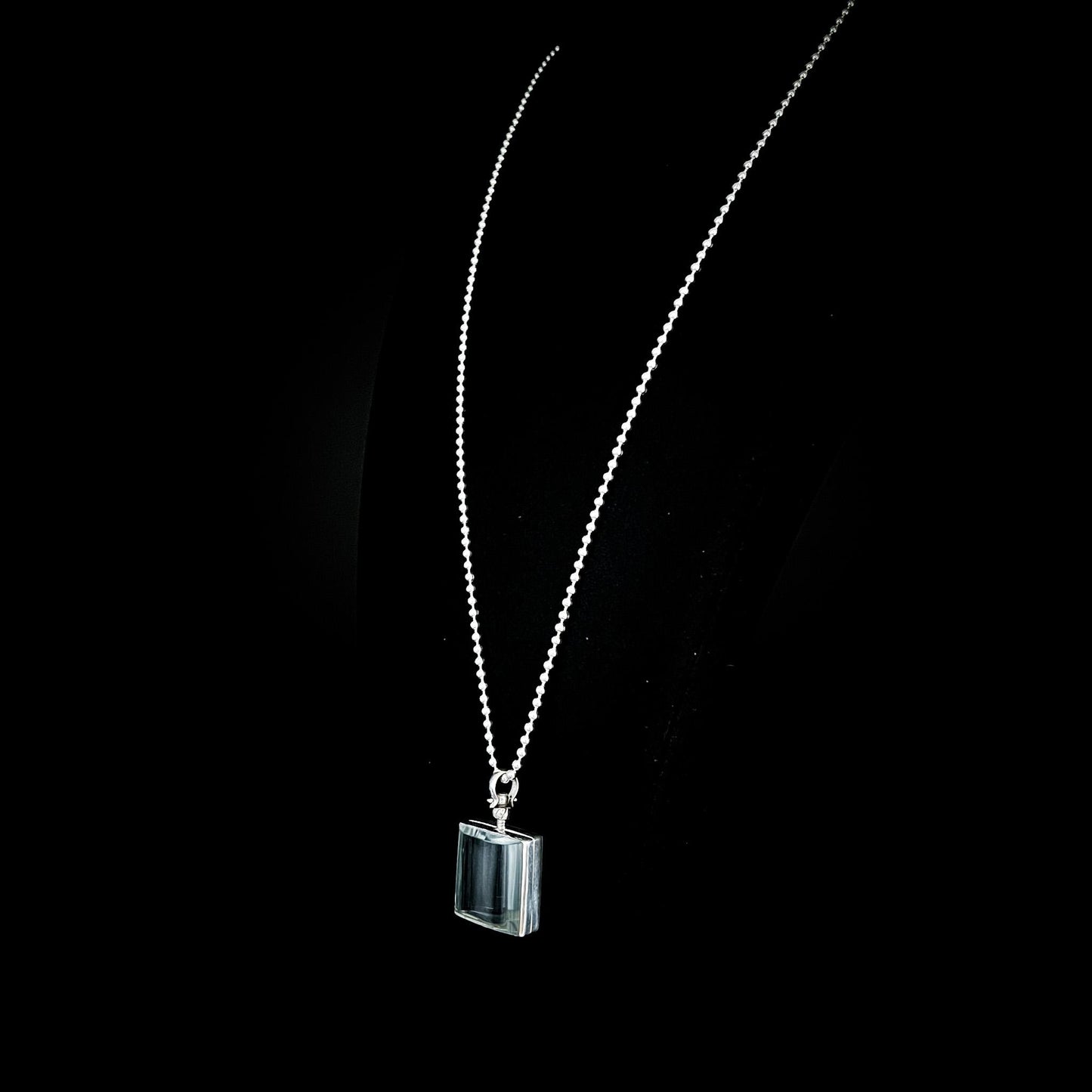 ASHES OF HIS HOODIE rectangular glass and sterling silver pendant necklace on a black background by ROCKSTAR★REFINEMENTS