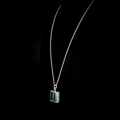 ASHES OF HIS HOODIE rectangular glass and sterling silver pendant necklace on a black background by ROCKSTAR★REFINEMENTS