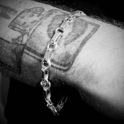Male wearing BACKLINE sterling silver bracelet by ROCKSTAR★REFINEMENTS™