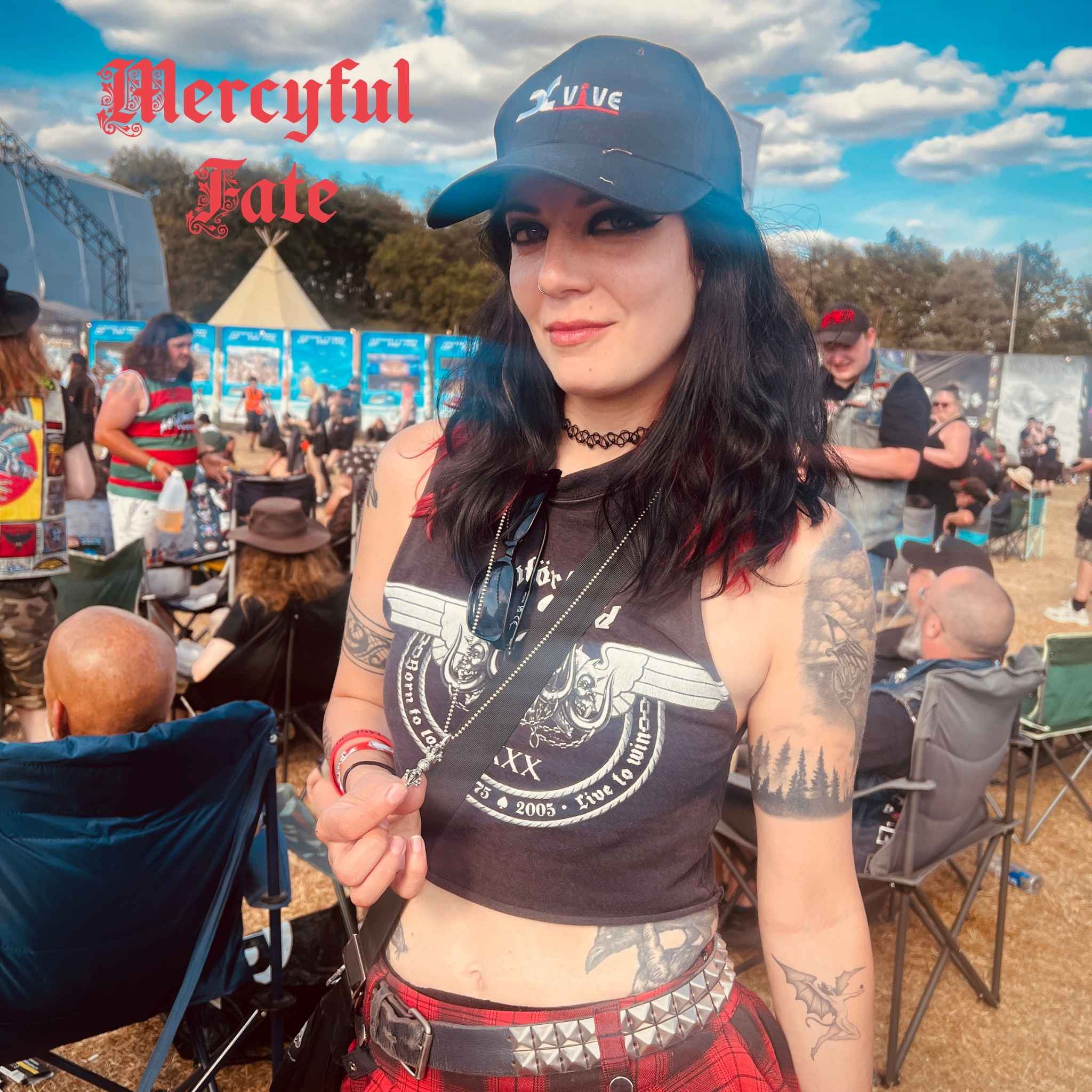 Becky Baldwin of Mercyful Fate wearing the WARBORN RELIC sterling silver pendant by ROCKSTAR★REFINEMENTS™ at Bloodstock Festival.