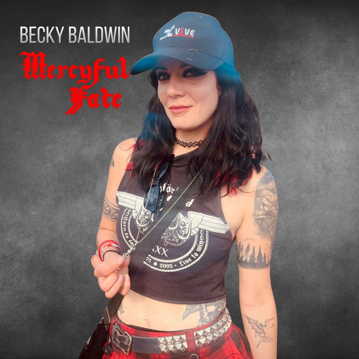 Becky Baldwin of Mercyful Fate wearing the WARBORN RELIC sterling silver pendant by ROCKSTAR★REFINEMENTS™