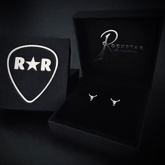 BULL-HEADED bull skull sterling silver earrings by ROCKSTAR★REFINEMENTS™ photographed in branded jewellery box 