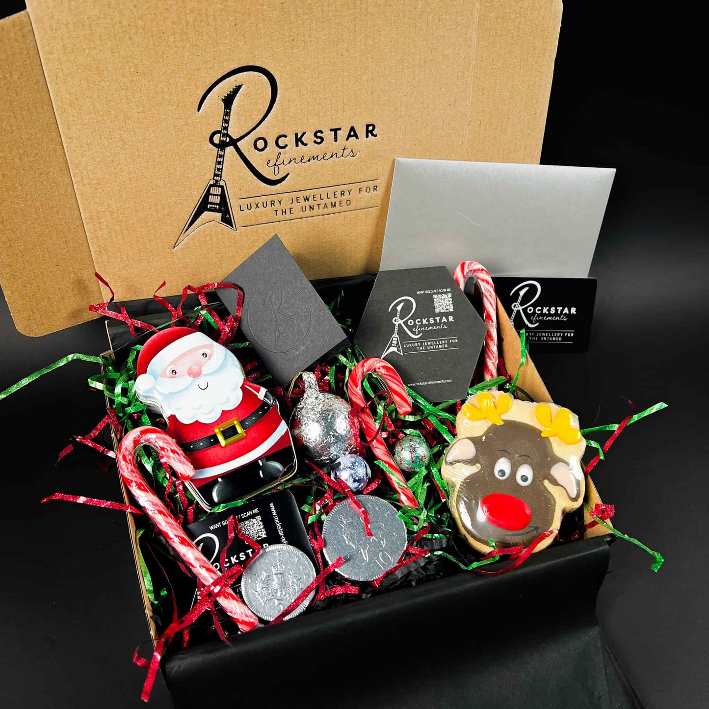 ROCKSTAR CHRISTMAS GIFT BOX. Turn your ROCKSTAR★REFINEMENTS Gift Voucher into a proper Christmas moment — boxed, packed with festive treats and ready to drop straight under the tree.