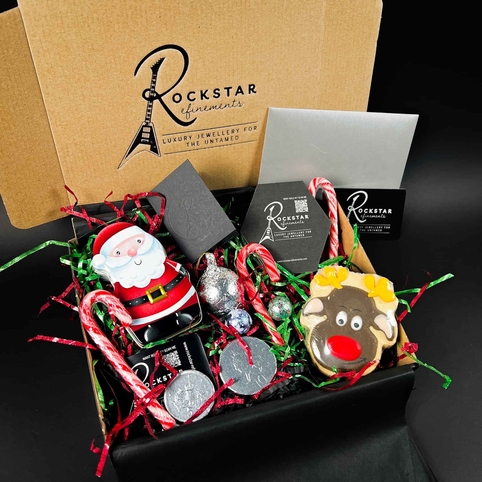 ROCKSTAR CHRISTMAS GIFT BOX. Turn your ROCKSTAR★REFINEMENTS Gift Voucher into a proper Christmas moment — boxed, packed with festive treats and ready to drop straight under the tree.