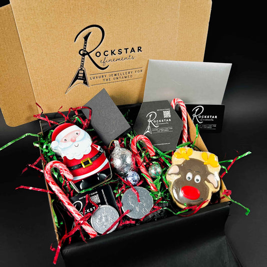 ROCKSTAR CHRISTMAS GIFT BOX. Turn your ROCKSTAR★REFINEMENTS Gift Voucher into a proper Christmas moment — boxed, packed with festive treats and ready to drop straight under the tree.