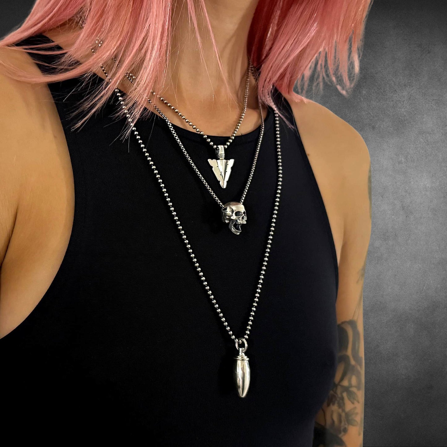 FINAL POINT, RESTING DEAD FACE, and PRETTY LOADED headline the PRETTY LITTLE DETAILS collection as shown on model 