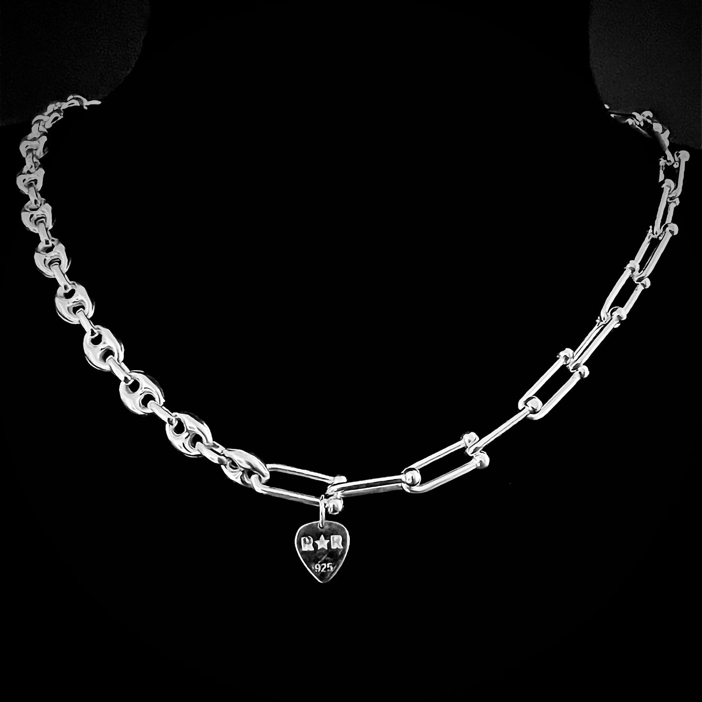 'FUSION' — sterling silver chain necklace with dual links — rear view showing branded R★R tag. Shown on a black background.
