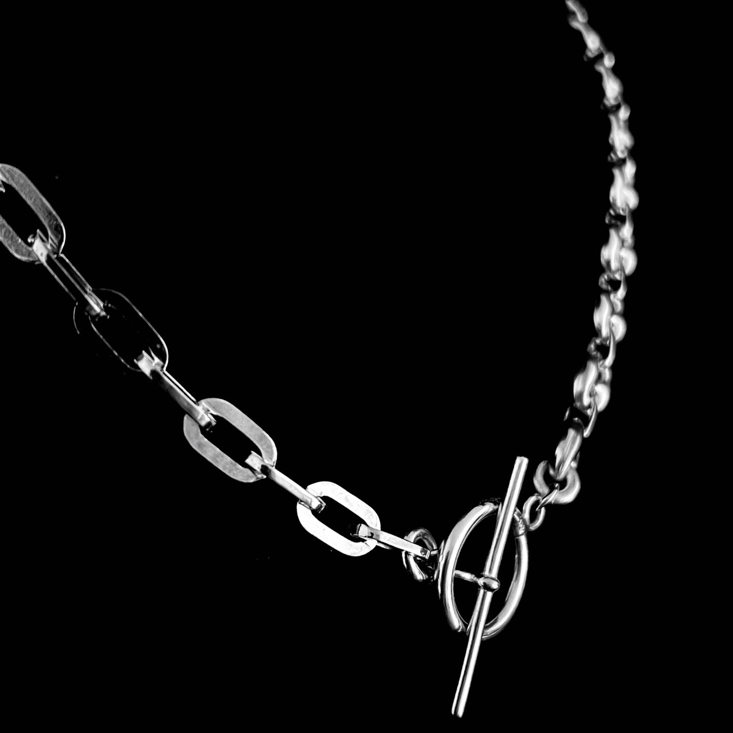TWIN LEAD dual-chain sterling silver necklace from the DUALITY collection by ROCKSTAR★REFINEMENTS™ — side view showing close-up of paperclip  chain, on black background