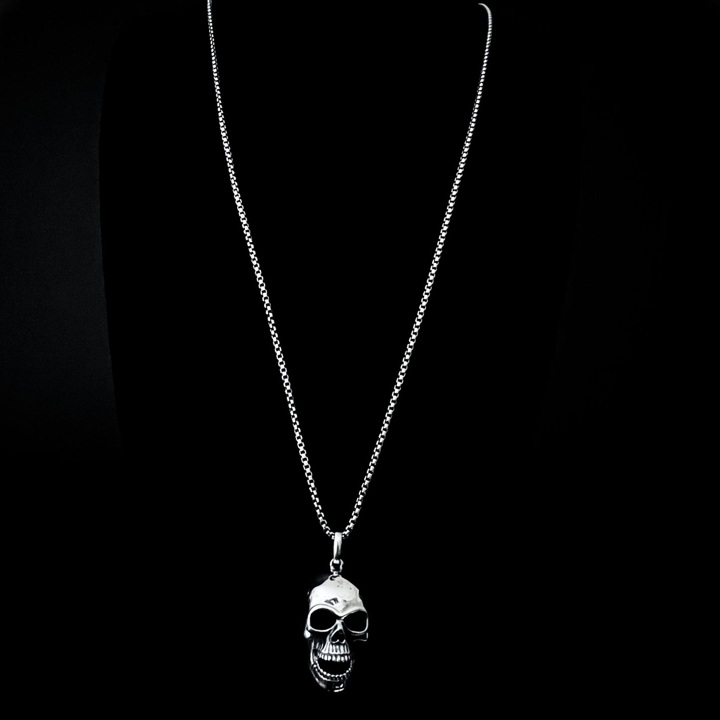 Full length photo of FINAL LAUGH — sterling silver skull pendant with on a 26-inch oxidised box chain by ROCKSTAR★REFINEMENTS