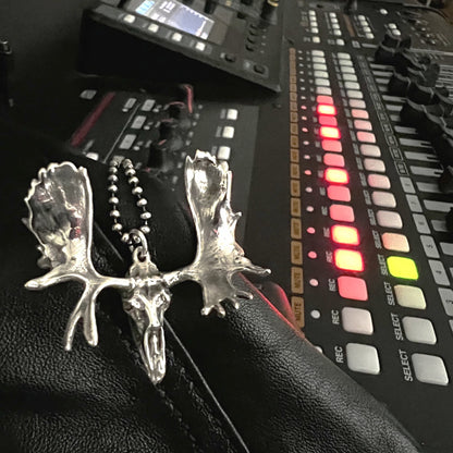 FULL METAL MOOSE — sterling silver moose head pendant with antlers on an oxidised ball chain, photographed in a recording studio by ROCKSTAR★REFINEMENTS