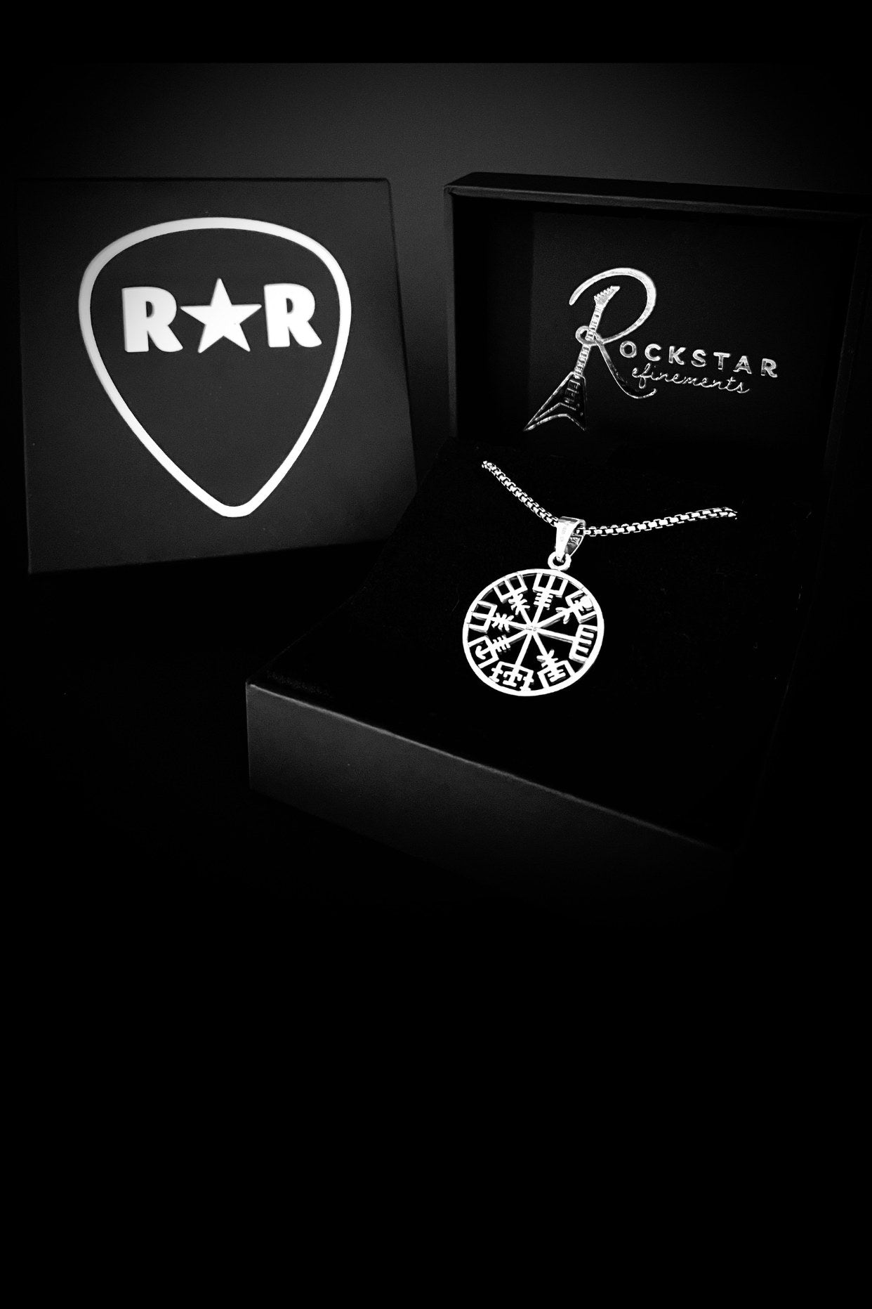 ROCKSTAR★REFINEMENTS RECKLESS ROUTE pendant showcased in signature matte-black branded box. 