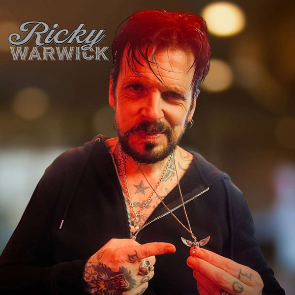 Artist wearing Rockstar Refinements jewellery