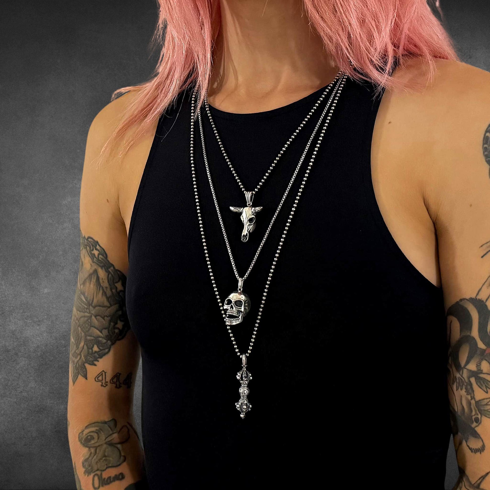 NO BS sterling silver bull skull pendant worn in a layered look as part of the HARDER : FOR HIM collection 