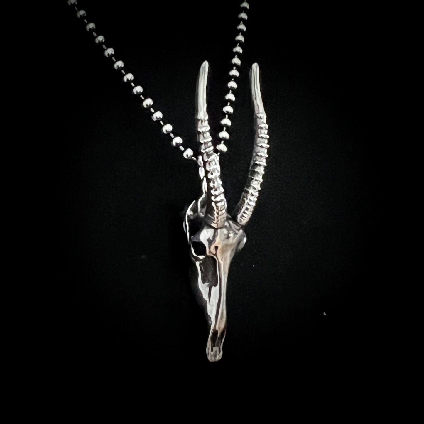 Silver antelope skull pendant necklace on a black background – NO GRAZING BACK by ROCKSTAR★REFINEMENTS