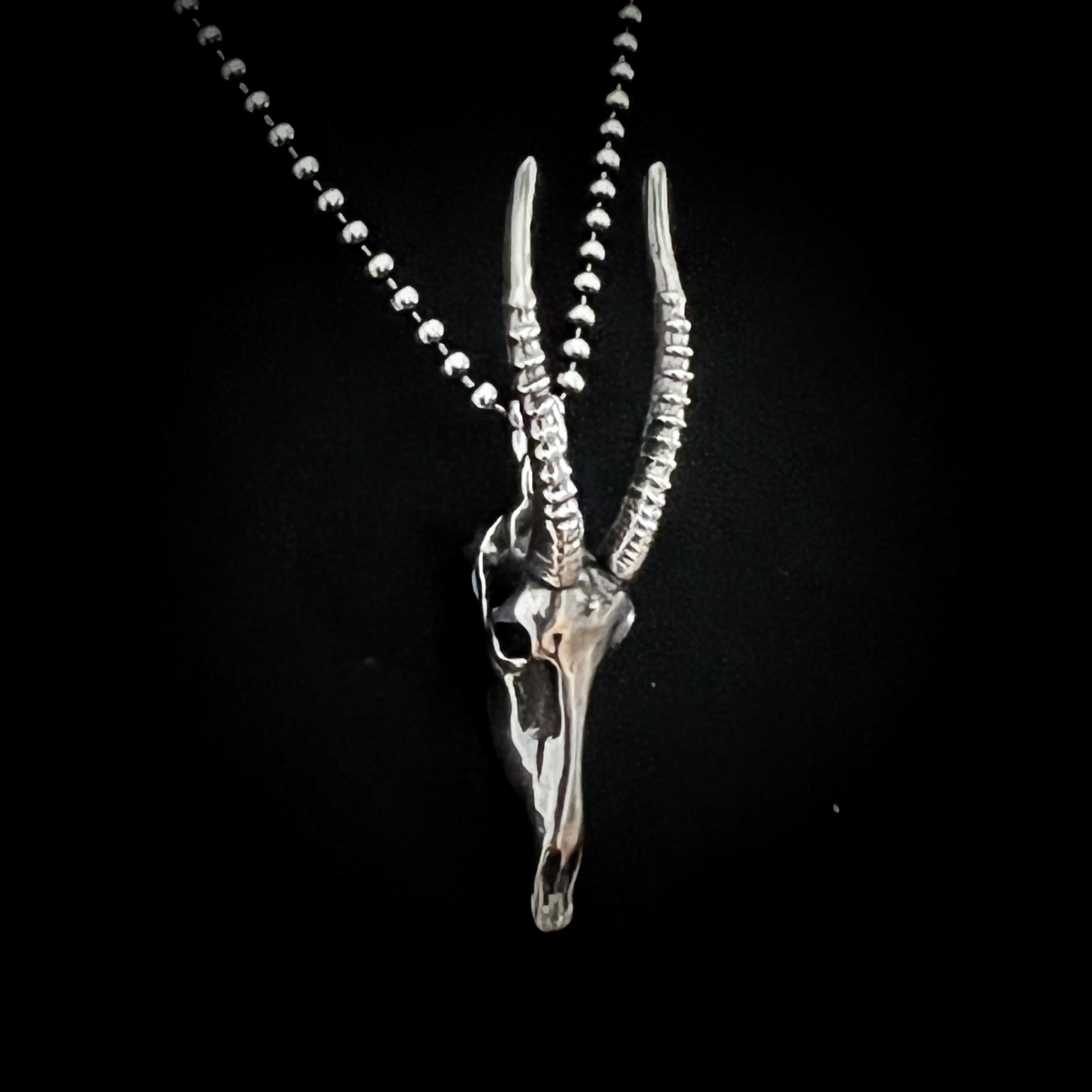 Silver antelope skull pendant necklace on a black background – NO GRAZING BACK by ROCKSTAR★REFINEMENTS