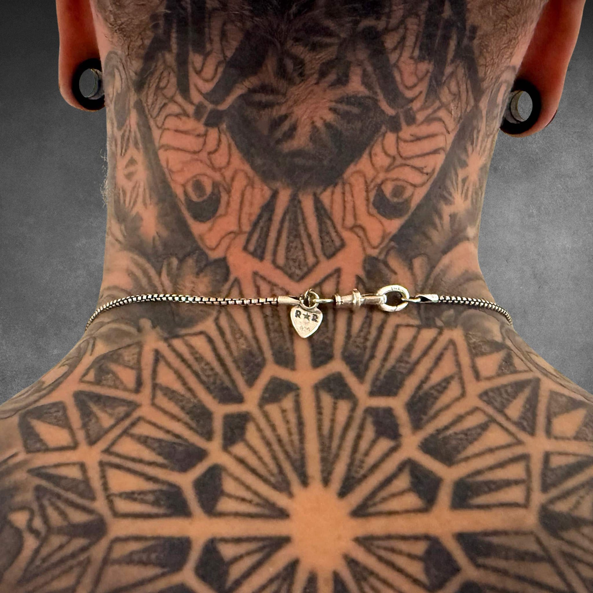 Rear view of the RECKLESS ROUTE showing clasp detail on 26-inch chain