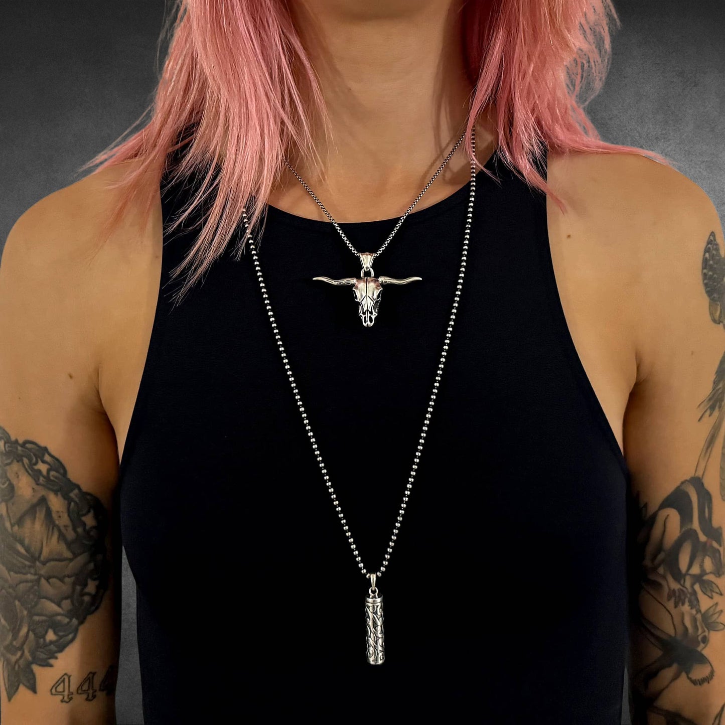 POINT OF NO RETURN featured with POISON IS THE CURE worn by girl with tattoos and pink hair 