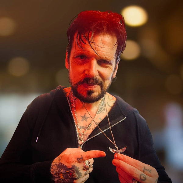 Artist wearing Rockstar Refinements jewellery