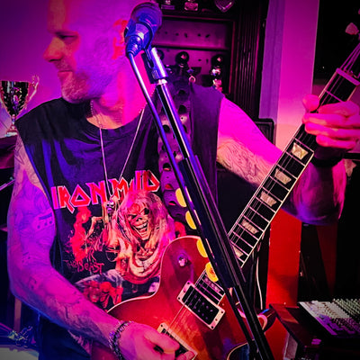 Guitarist from Riff Raff tearing it up in