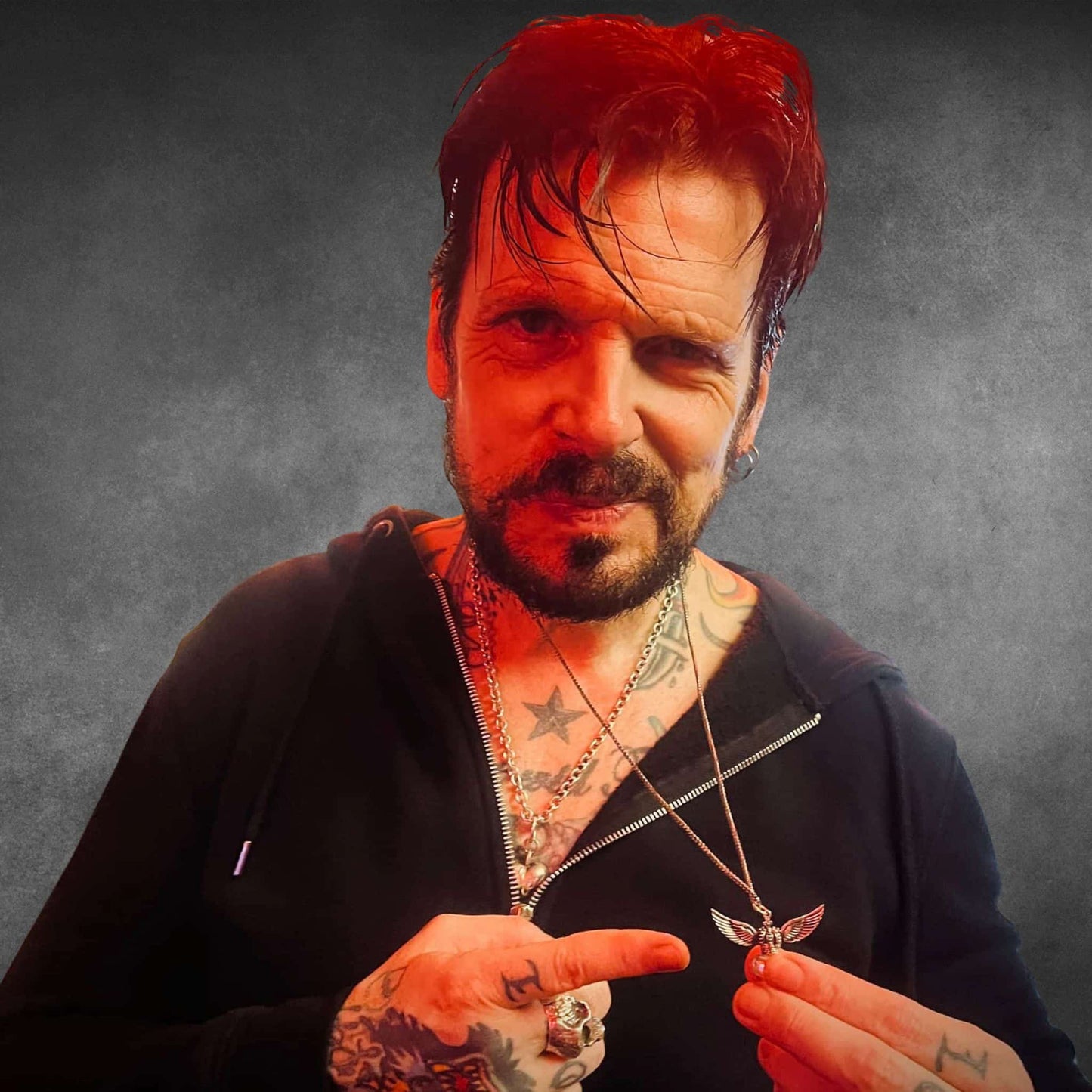 Ricky Warwick wearing WILD AT HEART sterling silver winged heart pendant
