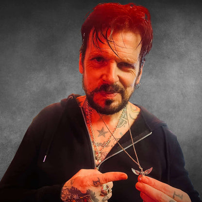 Ricky Warwick wearing WILD AT HEART sterling silver winged heart pendant