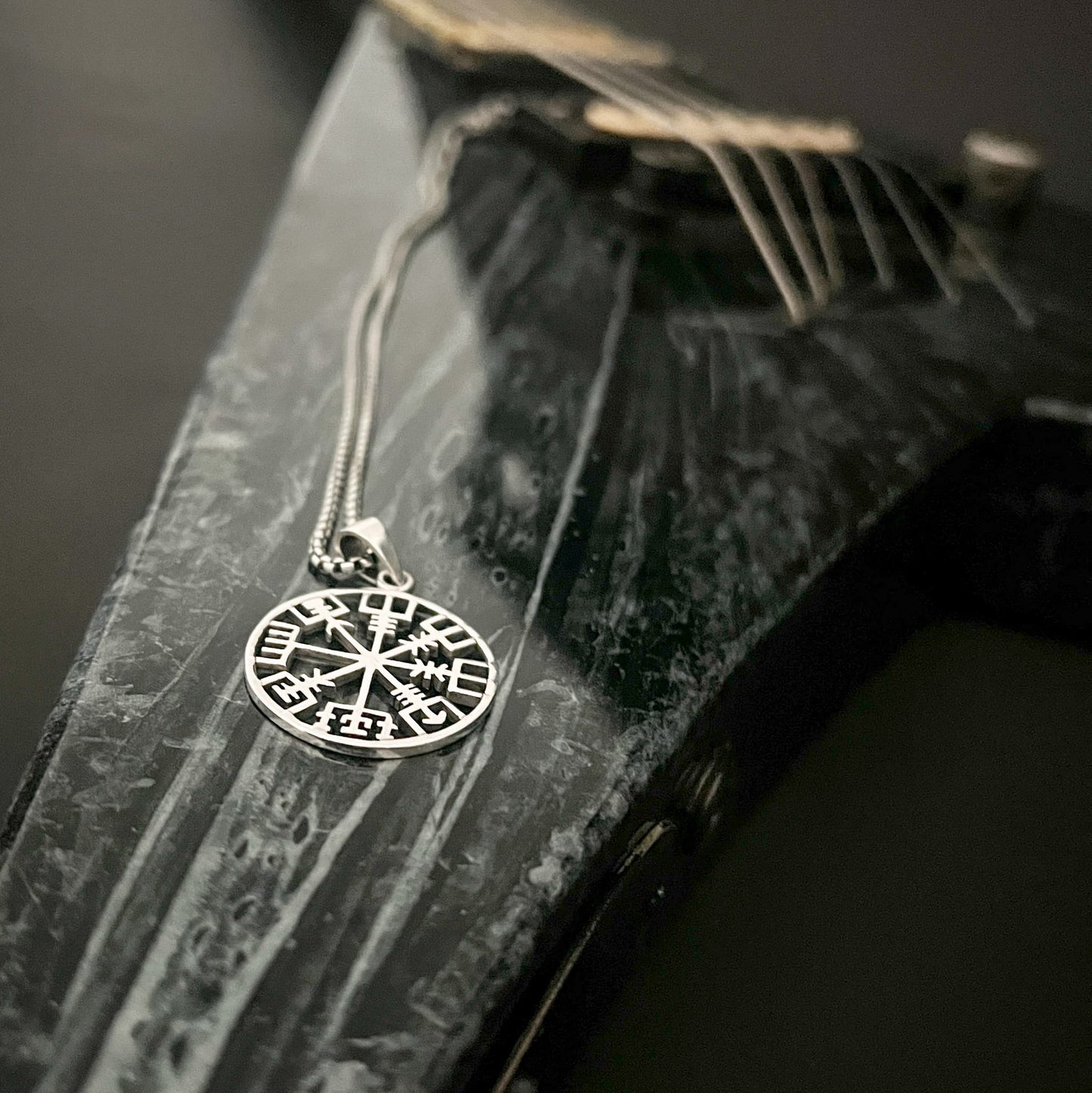 Sterling silver RECKLESS ROUTE compass on Jackson flying V guitar by ROCKSTAR★REFINEMENTS