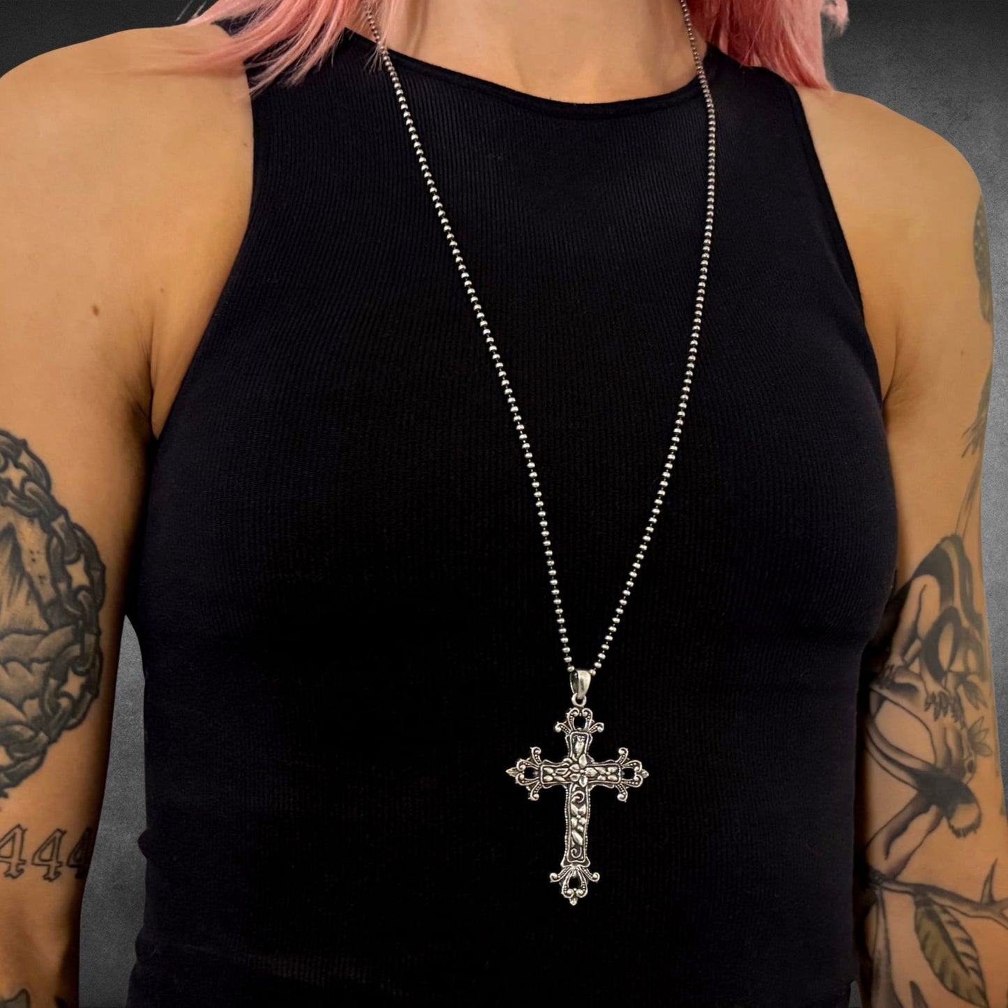 THE OUTLAW'S CROSS on 30 inch 2.5mm ball chain photographed on model 
