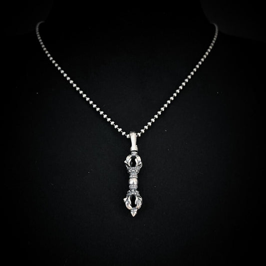 The WARBORN MINI on 18-inch ball chain, photographed on black background